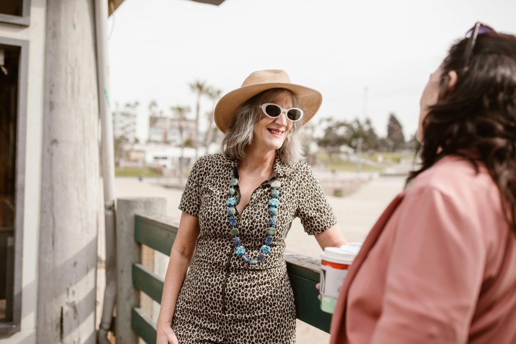 Older women talking on a balcony